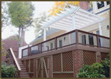 Custom Deck with TimberTech flooring,rails,and fascia.Vinyl Pergola and Privacy Screening in Bexley West Subdivision.