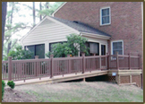 Wheelchair ramp and small deck with TimberTech decking and rails in Henrico West End.